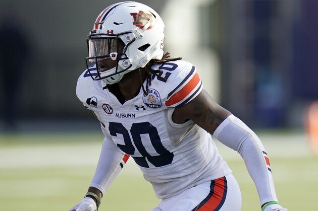 Auburn defensive back Jamien Sherwood (20) covers a play against Northwestern during the second half of the Citrus Bowl NCAA college football game, Friday, Jan. 1, 2021, in Orlando, Fla. (AP Photo/John Raoux)