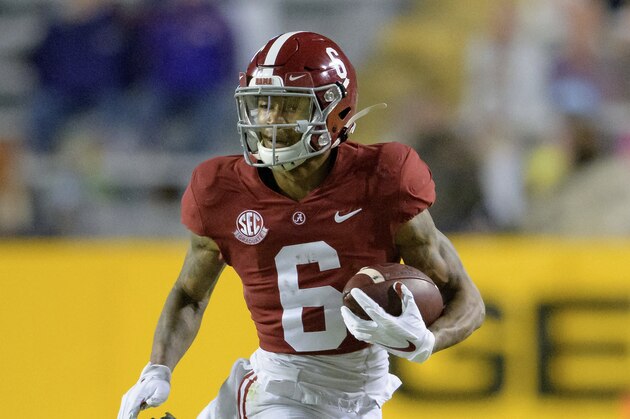 Alabama wide receiver DeVonta Smith (6) runs for gain during an NCAA college football game against LSU in Baton Rouge, La., Saturday, Dec. 5, 2020. (AP Photo/Matthew Hinton)