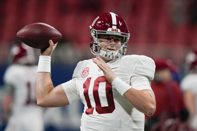 Alabama quarterback Mac Jones (10) warms up before the first half of the Southeastern Conference championship NCAA college football game against Florida, Saturday, Dec. 19, 2020, in Atlanta. (AP Photo/Brynn Anderson)