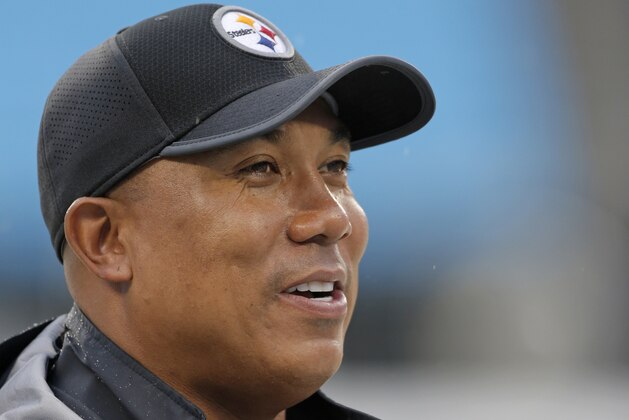 FILE - In this Thursday, Aug. 31, 2017, file photo, former Pittsburgh Steelers wide receiver Hines Ward walks the sidelines before an NFL preseason football game against the Carolina Panthers in Charlotte, N.C. On Tuesday, Nov. 27, 2018, the Alliance of American Football, an eight-team spring league that begins play the weekend after the Super Bowl, will stage a