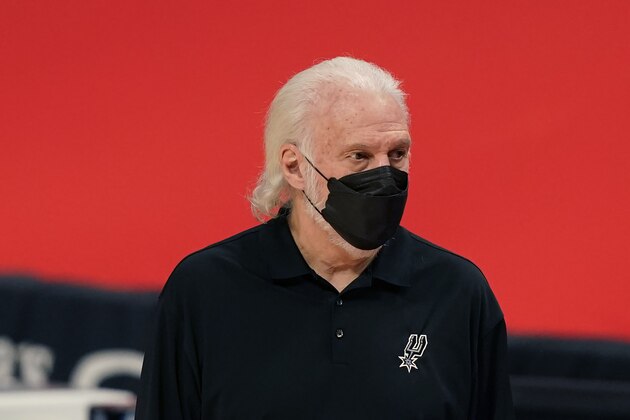 San Antonio Spurs head coach Gregg Popovich watches from the sideline during the first half of an NBA basketball game against the Detroit Pistons, Monday, March 15, 2021, in Detroit. (AP Photo/Carlos Osorio)