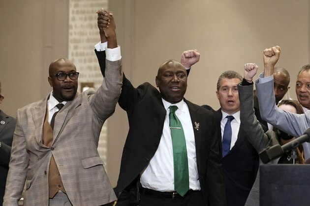 The Rev. Al Sharpton, center, joins members of George Floyd's family and supporters during a news conference after the verdict was read in the trial of former Minneapolis Police officer Derek Chauvin, Tuesday, April 20, 2021, in Minneapolis. (AP Photo/John Minchillo)