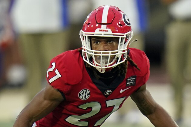 Georgia defensive back Eric Stokes covers a play against Florida during the first half of an NCAA college football game, Saturday, Nov. 7, 2020, in Jacksonville, Fla. (AP Photo/John Raoux)