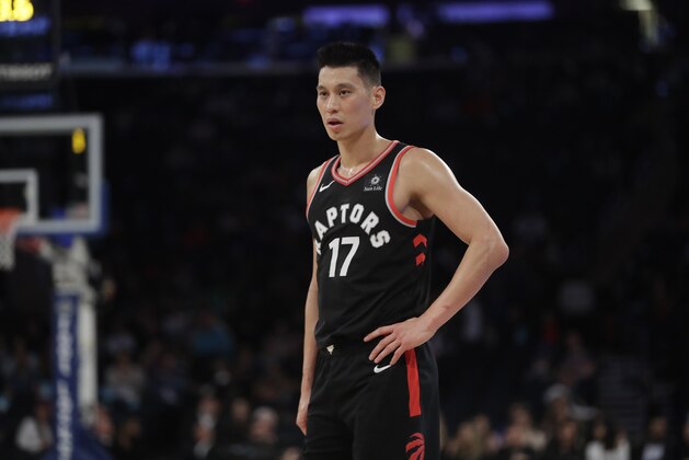 FILE - In this March 28, 2019, file photo, Toronto Raptors' Jeremy Lin stands on the court during the second half of the team's NBA basketball game against the New York Knicks in New York. Golden State Warriors coach Steve Kerr will support G League guard Lin and is hopeful of an investigation into what discriminatory act caused Lin to speak out about racism facing Asian Americans. In a heartfelt social media post, Lin didn't go into specifics about what happened except to reference he had been called “coronavirus” on the court. (AP Photo/Frank Franklin II, File)