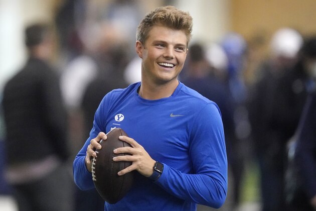 BYU quarterback Zach Wilson warms up before participating in the school's pro day football workout for NFL scouts Friday, March 26, 2021, in Provo, Utah. (AP Photo/Rick Bowmer)