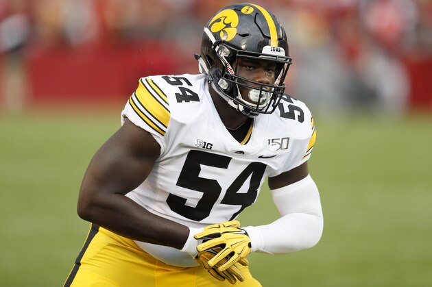 Iowa defensive tackle Daviyon Nixon stretches during the first half of an NCAA college football game against Iowa State, Saturday, Sept. 14, 2019, in Ames, Iowa. (AP Photo/Charlie Neibergall)