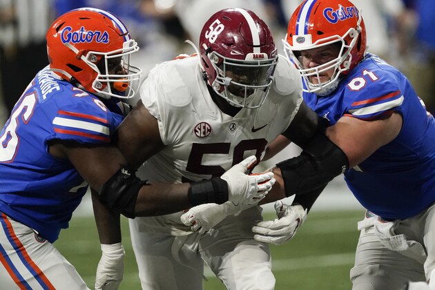 Alabama defensive lineman Christian Barmore (58) works against Florida during the second half of the Southeastern Conference championship NCAA college football game, Saturday, Dec. 19, 2020, in Atlanta. (AP Photo/John Bazemore)