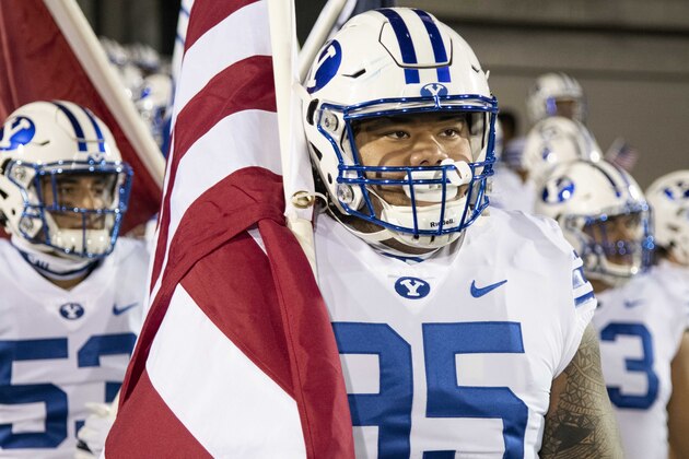 BYU defensive lineman Khyiris Tonga (95) awaits to take the field before an NCAA college football game against the Navy, Monday, Sept. 7, 2020, in Annapolis, Md. (AP Photo/Tommy Gilligan)