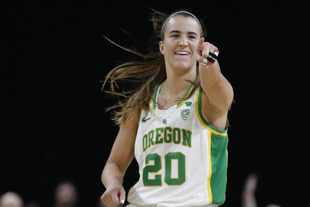 FILE - In this March 8, 2020, file photo, Oregon's Sabrina Ionescu (20) reacts after her team scored against Stanford during the second half of an NCAA college basketball game in the final of the Pac-12 women's tournament in Las Vegas. New York Liberty star Sabrina Ionescu is checking in periodically from the WNBA bubble at IMG Academy. She is offering her thoughts on her rookie season at the WNBA bubble as told to AP Basketball Writer Doug Feinberg. (AP Photo/John Locher, File)