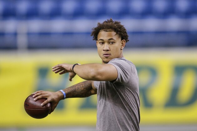 FILE - North Dakota State quarterback Trey Lance throws at the school's football NFL Pro Day in Fargo, N.D., in this Friday, March, 12, 2021, file photo. Lance will likely be one of the first two players drafted from non-Football Bowl Subdivision programs next week. (AP Photo/Andy Clayton-King, File)