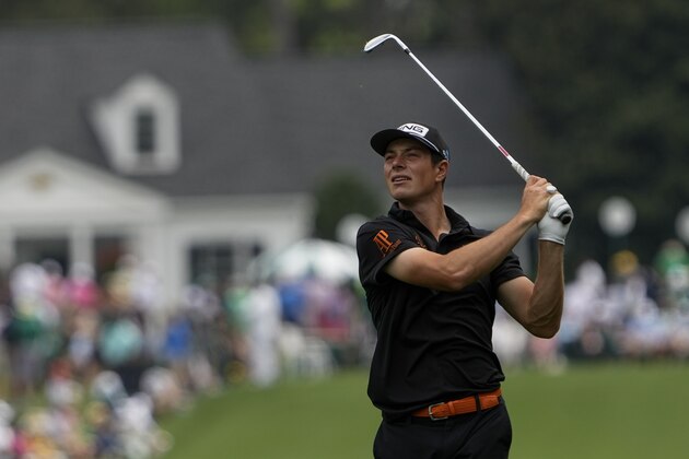 Viktor Hovland, of Norway, watches his shot not the first hole during the final round of the Masters golf tournament on Sunday, April 11, 2021, in Augusta, Ga. (AP Photo/David J. Phillip)