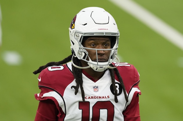 Arizona Cardinals wide receiver DeAndre Hopkins (10) walks off the field while warming up before an NFL football game against the Los Angeles Rams Sunday, Jan. 3, 2021, in Inglewood, Calif. (AP Photo/Ashley Landis)