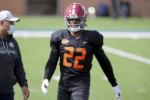 National Team running back Najee Harris of Alabama (22) walks to the sideline during the National team practice for the NCAA college Senior Bowl in Mobile, Ala., Wednesday, Jan. 27, 2021. (AP Photo/Rusty Costanza)