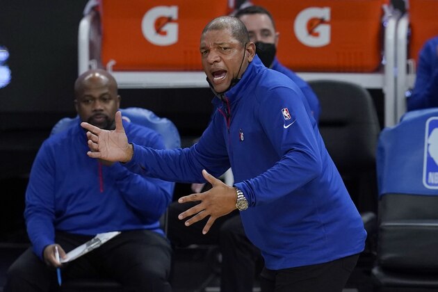 Philadelphia 76ers coach Doc Rivers gestures during the first half of the team's NBA basketball game against the Golden State Warriors in San Francisco, Tuesday, March 23, 2021. (AP Photo/Jeff Chiu)