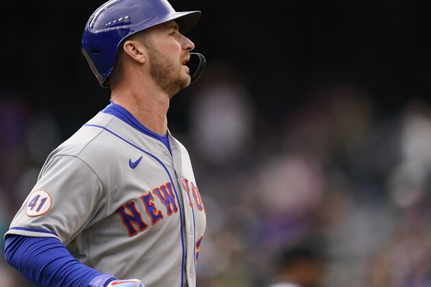 New York Mets first baseman Pete Alonso (20) in the eighth inning of a baseball game Sunday, April 18, 2021, in Denver. (AP Photo/David Zalubowski)