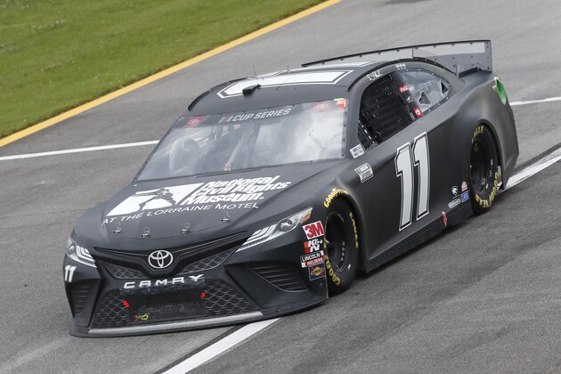 Denny Hamlin (11) heads to the pits during the NASCAR Cup Series auto race at the Talladega Superspeedway in Talladega Ala., Monday, June 22, 2020. (AP Photo/John Bazemore)