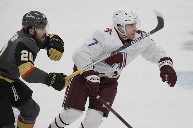 Colorado Avalanche defenseman Devon Toews (7) skates past Vegas Golden Knights center Chandler Stephenson (20) during the first period of an NHL hockey game in Denver, Saturday, March 27, 2021. Toews scored in the first period. (AP Photo/Joe Mahoney) Colorado Avalanche defenseman Devon Toews (7) skates past Vegas Golden Knights center Chandler Stephenson (20) during the first period of an NHL hockey game in Denver, Saturday, March 27, 2021. Toews scored in the first period. (AP Photo/Joe Mahoney)