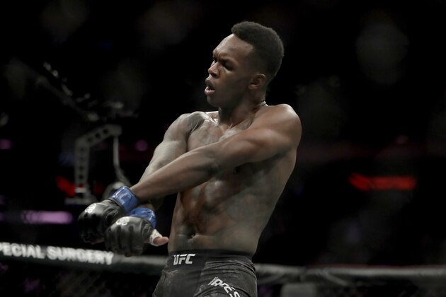 Israel Adesanya reacts after defeating Derek Brunson by technical knockout during the first round of a middleweight mixed martial arts bout at UFC 230, Saturday, Nov. 3, 2018, at Madison Square Garden in New York. (AP Photo/Julio Cortez)