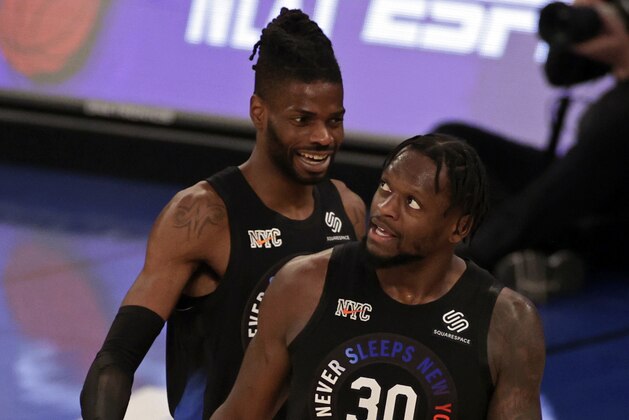New York Knicks forward Julius Randle (30) reacts with center Nerlens Noel (3) late during overtime of an NBA basketball game against the New Orleans Pelicans on Sunday, April 18, 2021, in New York. (AP Photo/Adam Hunger, Pool)