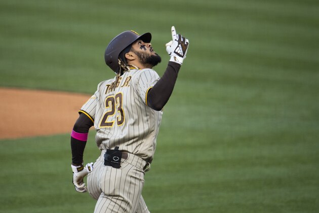 San Diego Padres' Fernando Tatis Jr. celebrates his solo home run during the first inning of a baseball game against the Los Angeles Dodgers in Los Angeles, Saturday, April 24, 2021. (AP Photo/Kyusung Gong)