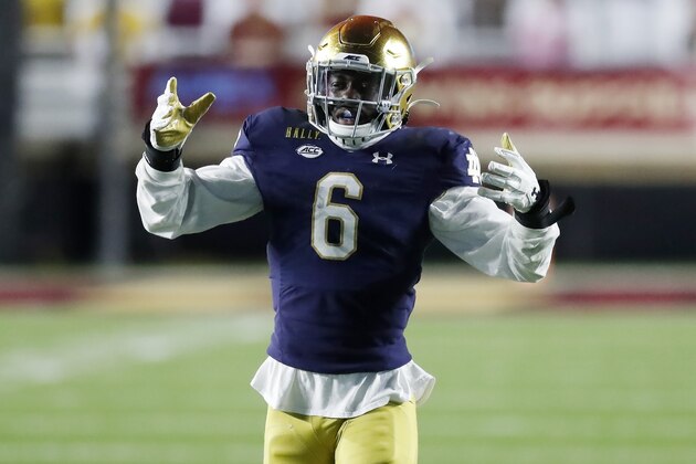 Notre Dame linebacker Jeremiah Owusu-Koramoah plays against Boston College during the second half of an NCAA college football game, Saturday, Nov. 14, 2020, in Boston. Owusa-Koramoah was selected to The Associated Press All-America first-team defense, Monday, Dec. 28, 2020.(AP Photo/Michael Dwyer)