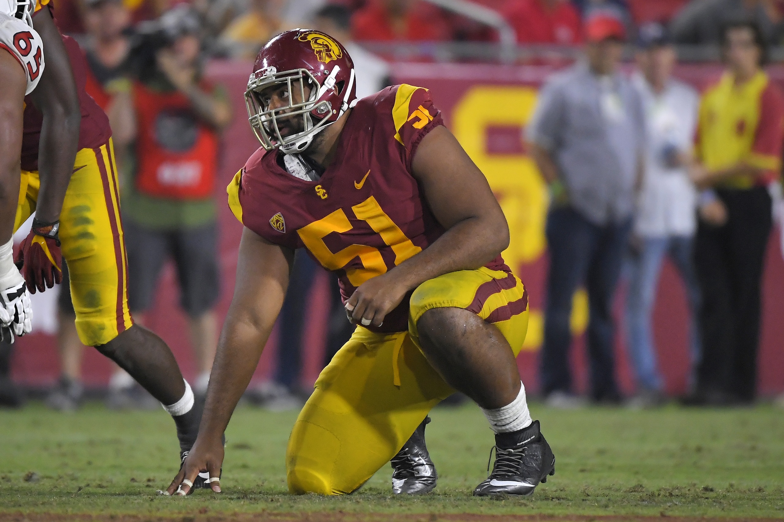 FILE - In this Aug. 31, 2019, file photo, Southern California defensive lineman Marlon Tuipulotu gets ready to run a play during the second half of an NCAA college football game against Fresno State, in Los Angeles. Southern California assistant coach Chad Kauha’aha’a always knew defensive tackle Marlon Tuipulotu could be a special player. Kauha’aha’a believed it when he tried to recruit Tuipulotu to Oregon State, and he is seeing it in his first season working with the redshirt sophomore for the No. 24 Trojans. “I knew he had the potential to be a great one,” Kauha’aha’a said Wednesday night, Sept. 11, 2019. (AP Photo/Mark J. Terrill, File)