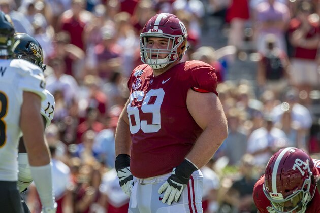 FILE - Alabama offensive lineman Landon Dickerson (69) is shown during the first half of an NCAA college football game against Southern Miss in Tuscaloosa, Ala., in this Saturday, Sept. 21, 2019, file photo. Dickerson was selected to The Associated Press All-America first-team offense, Monday, Dec. 28, 2020.  (AP Photo/Vasha Hunt, File)
