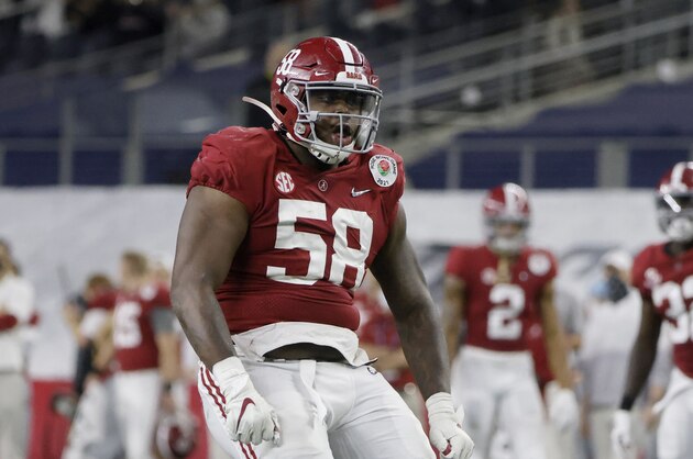 Alabama defensive lineman Christian Barmore (58) celebrates a sack against Notre Dame during the Rose Bowl NCAA college football game in Arlington, Texas, Friday, Jan. 1, 2021. (AP Photo/Michael Ainsworth)