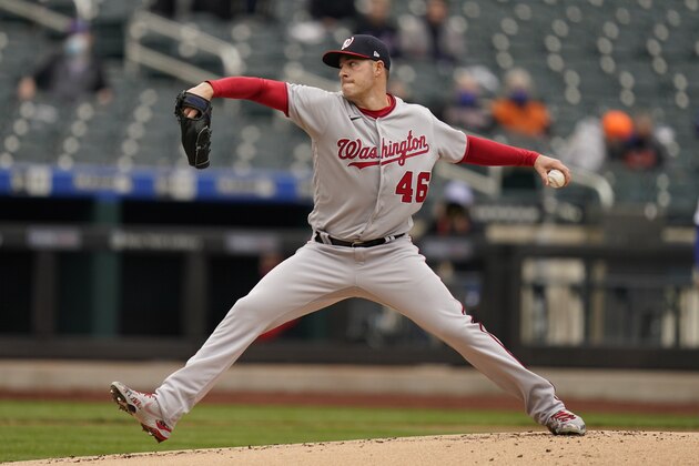 Washington Nationals starting pitcher Patrick Corbin throws during the first inning of a baseball game against the New York Mets at Citi Field, Sunday, April 25, 2021, in New York. (AP Photo/Seth Wenig)