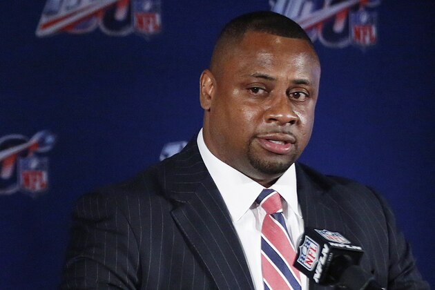 FILE - In this May 22, 2019, file photo, Troy Vincent, NFL executive vice president, speaks to the media during the owners meetings in Key Biscayne, Fla. The NFL will consult an advisory committee made up of former coaches, general managers and players on such issues as postponing, moving or even canceling games this season due to the coronavirus pandemic. Vincent said Wednesday, Aug. 19, 2020 that the advisers, who will report to Commissioner Roger Goodell, will help avoid any “inequities” in those decisions. Vincent did not identify any members of the panel, saying he was awaiting their approval to do so. (AP Photo/Brynn Anderson, File)
