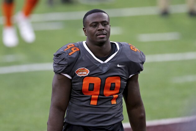 National Team defensive lineman Tarron Jackson of Coastal Carolina (99) walks off the field after the NCAA college football Senior Bowl in Mobile, Ala, Saturday, Jan. 30, 2021. (AP Photo/Rusty Costanza)
