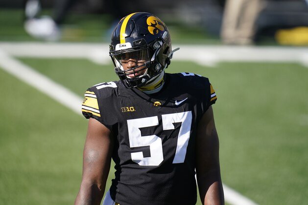 Iowa defensive lineman Chauncey Golston stands on the field before an NCAA college football game against Michigan State, Saturday, Nov. 7, 2020, in Iowa City, Iowa. (AP Photo/Charlie Neibergall)