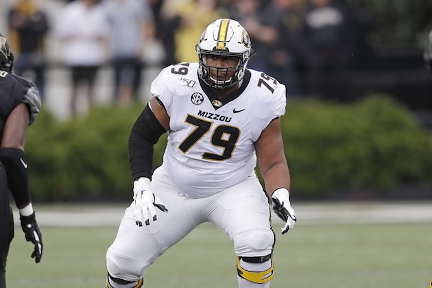 Missouri offensive lineman Larry Borom (79) defends against Vanderbilt defensive lineman Dayo Odeyingbo (10) in the first half of an NCAA college football game Saturday, Oct. 19, 2019, in Nashville, Tenn. (AP Photo/Mark Humphrey)