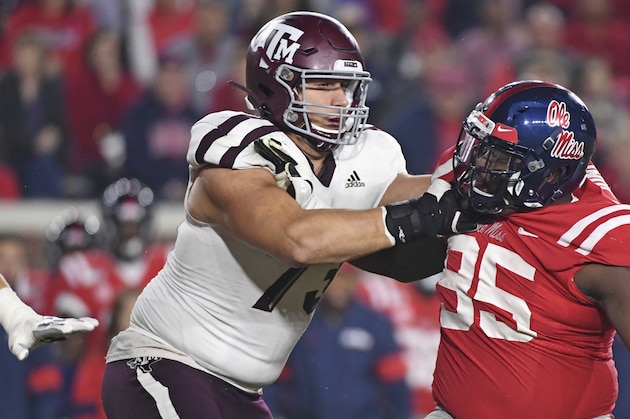 Texas A&M offensive lineman Jared Hocker (73) blocks Mississippi defensive lineman Benito Jones (95) during the second half of an NCAA college football game in Oxford, Miss., Saturday, Oct. 19, 2019. Texas A&M won 24-17. (AP Photo/Thomas Graning)