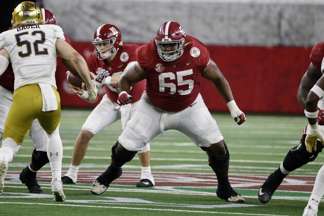 Alabama offensive lineman Deonte Brown (65) prepares to block against Norte Dame during the Rose Bowl NCAA college football game in Arlington, Texas, Friday, Jan. 1, 2021. (AP Photo/Michael Ainsworth)