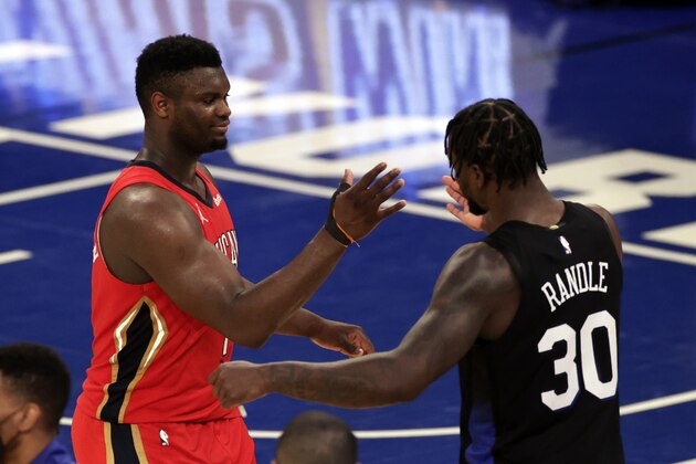 New Orleans Pelicans forward Zion Williamson, left, shakes hands with New York Knicks forward Julius Randle, right, after overtime of an NBA basketball game Sunday, April 18, 2021, in New York.  (AP Photo/Adam Hunger, Pool)