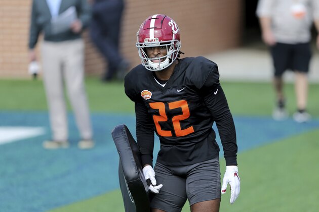 National Team running back Najee Harris of Alabama (22) listens to instructions during the National team practice for the NCAA college Senior Bowl in Mobile, Ala., Wednesday, Jan. 27, 2021. (AP Photo/Rusty Costanza)