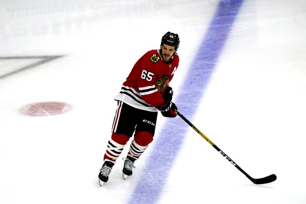 Chicago Blackhawks right wing Andrew Shaw warms up before an NHL hockey game against the Carolina Hurricanes in Chicago, Thursday, Feb. 4, 2021. (AP Photo/Nam Y. Huh)