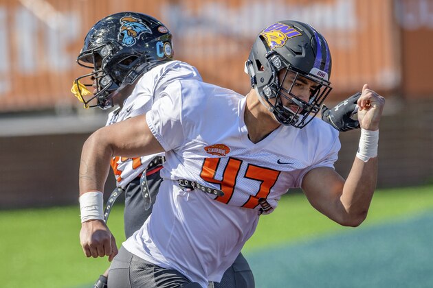 National Team defensive lineman Elerson Smith of Northern IowaÂ (FCS) (47) runs a drill with defensive lineman Tarron Jackson of Coastal Carolina (99) during the National Team practice for the Senior Bowl college football game in Mobile, Ala., Thursday, Jan. 28, 2021. (AP Photo/Matthew Hinton)