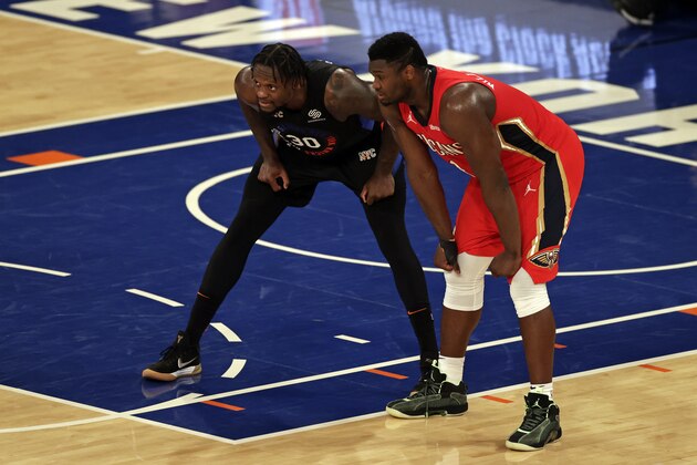 New York Knicks forward Julius Randle (30) and New Orleans Pelicans forward Zion Williamson (1) during a break in game action during the second half of an NBA basketball game Sunday, April 18, 2021, in New York. The Knicks won in overtime 122-112. (AP Photo/Adam Hunger, Pool)