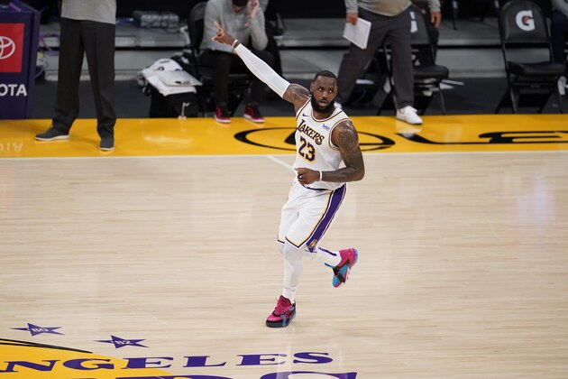 Los Angeles Lakers forward LeBron James (23) signals during the first half of an NBA basketball game against the Atlanta Hawks Saturday, March 20, 2021, in Los Angeles. (AP Photo/Marcio Jose Sanchez)
