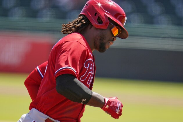 Philadelphia Phillies' Odubel Herrera rounds third after hitting a solo home run off Pittsburgh Pirates pitcher Steven Brault during the third inning of a spring training exhibition baseball game in Bradenton, Fla., Sunday, March 14, 2021. (AP Photo/Gene J. Puskar
