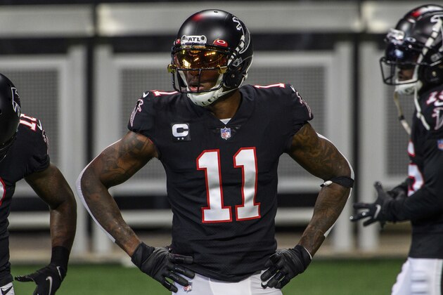 Atlanta Falcons wide receiver Julio Jones (11) warms up before an NFL football game against the New Orleans Saints, Sunday, Dec. 6, 2020, in Atlanta. The New Orleans Saints won 21-16. (AP Photo/Danny Karnik)