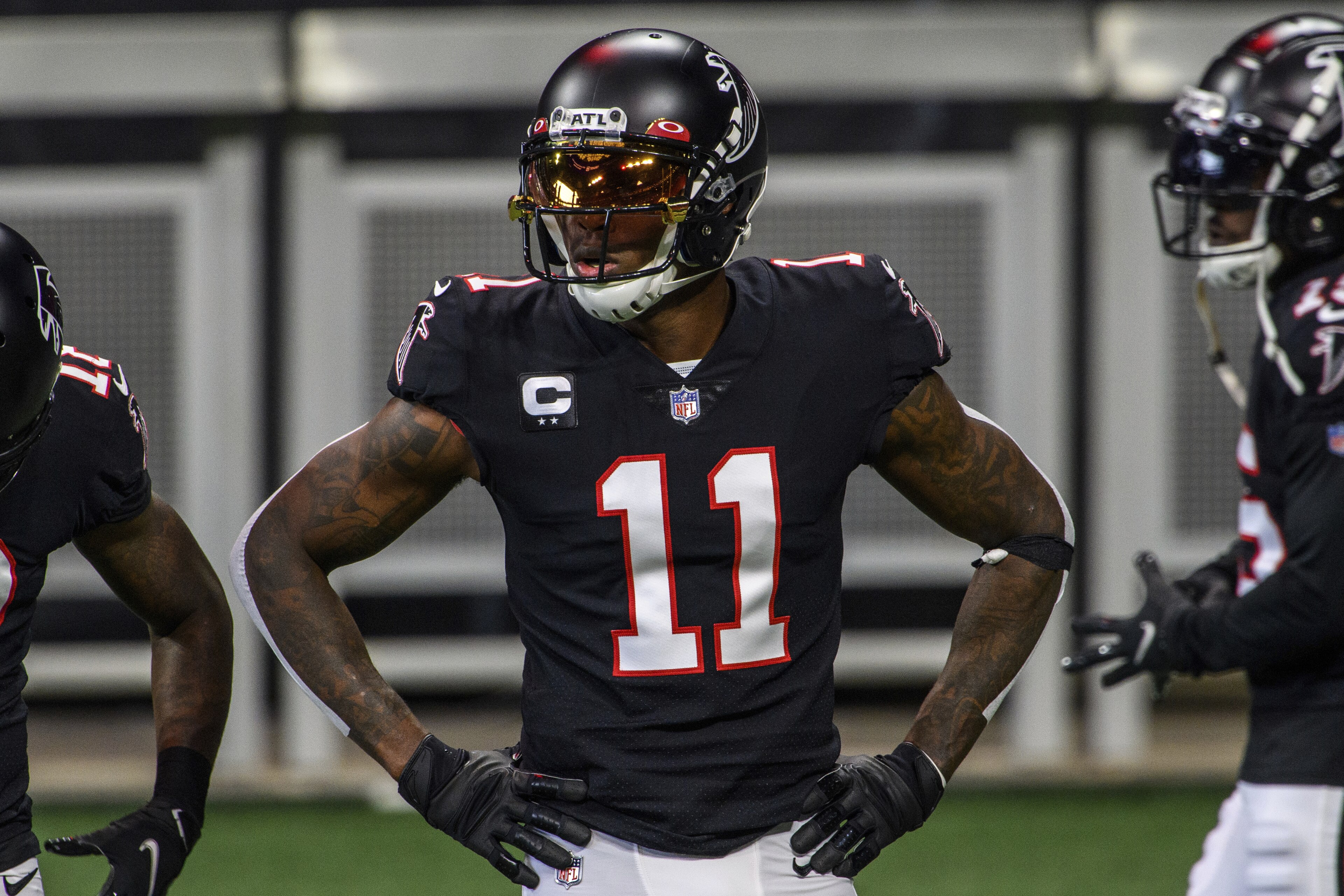 Atlanta Falcons wide receiver Julio Jones (11) warms up before an NFL football game against the New Orleans Saints, Sunday, Dec. 6, 2020, in Atlanta. The New Orleans Saints won 21-16. (AP Photo/Danny Karnik)