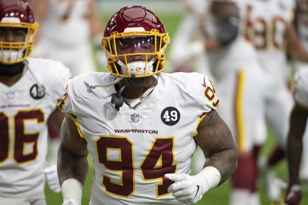 Washington Football Team defensive tackle Daron Payne (94) runs off the field after warming up for an NFL football game against the San Francisco 49ers, Sunday, Dec. 13, 2020, in Glendale, Ariz. (AP Photo/Jennifer Stewart)