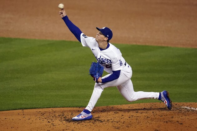 Los Angeles Dodgers starting pitcher Walker Buehler throws to a San Diego Padres batter during the third inning of a baseball game Thursday, April 22, 2021, in Los Angeles. (AP Photo/Marcio Jose Sanchez)