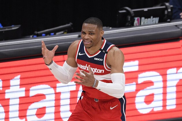 Washington Wizards guard Russell Westbrook (4) reacts after he was called for a foul during overtime of an NBA basketball game against the San Antonio Spurs, Monday, April 26, 2021, in Washington. The Spurs won 146-143. (AP Photo/Nick Wass)