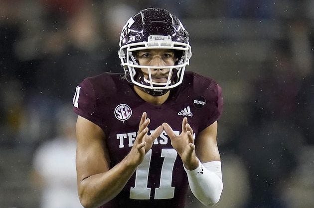 Texas A&M quarterback Kellen Mond (11) takes a snap against LSU during the second quarter of an NCAA college football game, Saturday, Nov. 28, 2020. in College Station, Texas. (AP Photo/Sam Craft)