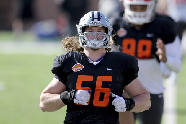 Defensive end Wyatt Hubert of Kansas State (56) warms up during the American team practice for the NCAA college football Senior Bowl in Mobile, Ala, Thursday, Jan. 28, 2021. (AP Photo/Rusty Costanza)