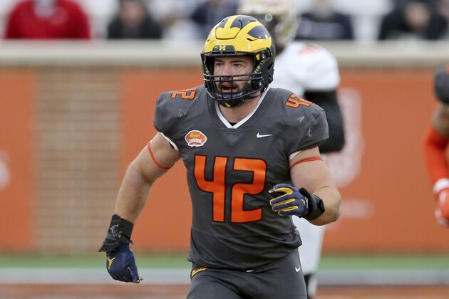 National Team fullback Ben Mason of Michigan (42) runs downfield during the second half of the NCAA college football Senior Bowl in Mobile, Ala, Saturday, Jan. 30, 2021. (AP Photo/Rusty Costanza)